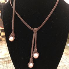 Genuine Freshwater Pearl Necklace On Very Soft Brown Deerskin Leather Slide. Pearls Are A Pink/Lavender Color. Genuine Pearl Necklace, Pink Lavender, Freshwater Pearl Necklace, Deer Skin, Soft Brown, Lavender Color, Leather Slides, Freshwater Pearl Necklaces, Adjustable Necklace