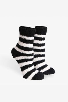 Slip into cozy comfort with our Striped Fuzzy Socks. These socks are not just soft and warm, but also feature a playful striped design for a touch of quirkiness. Perfect for keeping your feet warm on chilly nights, these socks are a must-have for any cozy night in! Fleece Socks, Boutique Decor, Comfy Socks, Mint And Navy, Soft Sock, Fuzzy Socks, Winter Socks, Cozy Night, Sock Gifts