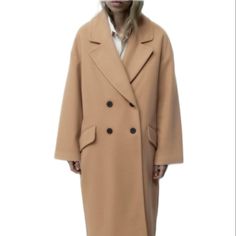 Roomy Lapel Collar Coat With Long Sleeves. Front Flap Pockets. Front Double Breasted Button Closure. Ref # 8372/298/704 Oversized Double-breasted Wool Coat For Spring, Oversized Double-breasted Spring Wool Coat, Zara Single Breasted Oversized Outerwear, Chic Oversized Wool Coat With Button Closure, Oversized Pea Coat With Buttons For Workwear, Oversized Office Outerwear With Double Button Closure, Zara Oversized Buttoned Outerwear, Oversized Zara Outerwear With Buttons, Zara Oversized Coat