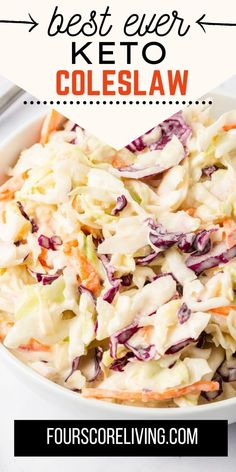 a white bowl filled with coleslaw and carrots on top of a table