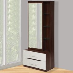 a white and brown dresser sitting next to a window