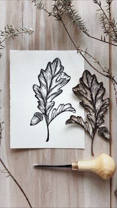 an inking technique is used to create leaf designs on paper with a rubber stamp