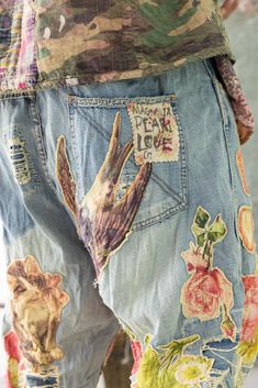 Avant-garde fascination, a Victorian collage on the verge of kaleidoscopic. These Floral Appliqué Miner Denims are the ageless attire of a true believer in beauty. Cotton Denim Hand-Distressing, Patching, Mending & Fading Pockets Appliqué Adjustable Mixed-Button Waist Adjustable Cinch Belt at Back Each Magnolia Pearl item is cut "One Size Fits Most". Please contact an MP Maestro for measurements. Magnolia Pearls, True Believer, Cat Applique, Cinch Belt, Denim Crafts, Magnolia Pearl, Upcycled Fashion, Jeans Diy, Floral Applique