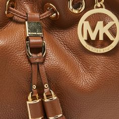 MICHAEL MICHAEL KORS Brown Leather Camden Drawstring HoboStylish handbags never fail to make a fashionable impression. Make this designer hobo yours by pairing it with your sophisticated workwear as well as chic casual looks. Size: Height: 29 cm, Width: 11 cm, Length: 35 cmMaterial: LeatherThis item has been used and may have some minor flaws. Before purchasing, please refer to the images for the exact condition of the item. Stylish Handbags, Chic Casual, Dior Shoes, Fendi Baguette, Chanel Handbags, Cartier Ring, Gucci Jackie Bag, Dior Saddle Bag, Louis Vuitton Neverfull