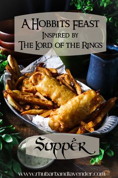 a plate full of fried food with the words, a hobbits feast inspired by the lord of the rings