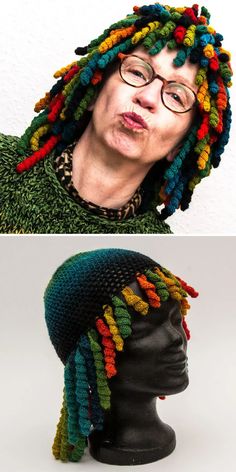 an old woman with dreadlocks on her head is making a funny face and looking at the camera