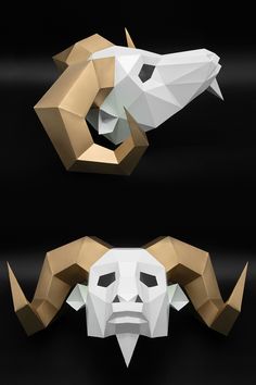 two paper masks made to look like animals, one with horns and the other with an animal's head