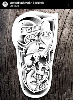 a sticker that is on the side of a wooden door with a skull and two faces