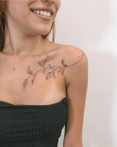 a woman with a tattoo on her chest