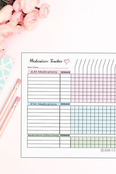 a printable medication tracker with pink flowers and pencils