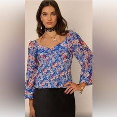 Blouse Is New With Tags! No Flaws! Size Xs, Smoke Free Home. The Bridgette Blouse From Rixo Is Made Of Floral-Printed Satin With Billowing Long Sleeves. Sweetheart Neck Long Sleeves Pulls Over 60% Viscose/40% Silk Dry Clean Imported Has A Side Zip. Feminine Blue Tops For Work, Casual Blue Fitted Blouse, Fitted V-neck Blue Blouse, Elegant Blue Tops For Spring, Elegant Blue Blouse For Brunch, Blue Floral Print Blouse For Party, Blue Fitted Blouse For Fall, Fitted Blue Blouse For Day Out, Blue Fitted Top For Brunch