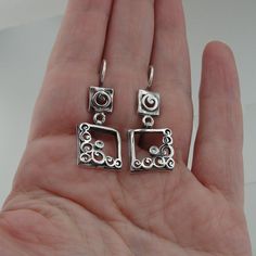 New beautiful long Earrings in square shape. These earrings are made of textured filigree 925 sterling silver with sparkling white CZ. These sterling silver decorated earrings will always make your look very chic. Labeled and stamped 925. This beauty will be sent to you with a modern recycled brown gift box. (All stains, if are any, are due to camera) Material: Sterling Silver 925 Gemstone: Sparkling White CZ Dimensions: Length: 35mm / 1.377 inch Width: 14 mm / 0.551 inch Labeled and stamped 925 Earrings Square, Crystal Earrings Wedding, Wedding Gifts For Bridesmaids, Filigree Earrings, Earrings Crystal, Cz Earrings, Earrings Wedding, Wedding Bridesmaid, Square Earrings