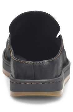 Heavy topstitching outlines a roomy round toe mule that is handcrafted with a high-traction rubber sole to ensure comfort and quality season after season. Removable comfort insole Leather upper/textile lining/rubber sole Imported Mule, Riding Helmets, Nordstrom Rack, Rubber Sole, Leather Upper, Nordstrom, Leather, Black