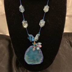 Available Only Till July 10,2032. Will Be Removed After That Date! Make An Offer If Interested! Semi Precious, Large Agate Stone, Accompanied With Some Clear Crystals, Gold Lock, Hand Made Beautiful Crystal Necklace. Never Used. Blue Promotes Tranquility, Relieving Stress And Better Communication. And Clear Brings Clarity And Cleansing From Negative Energies. Blue Gemstone Accents Necklace, Blue Crystal Jewelry With Gemstones, Blue Beaded Necklaces With Gemstone Accents For Gift, Bohemian Blue Jewelry With Gemstone Accents, Elegant Turquoise Crystal Necklaces For Jewelry Making, Blue Beaded Necklaces With Stones For Jewelry Making, Elegant Blue Crystal Necklace With Gemstone Accents, Elegant Blue Jewelry With Faceted Beads, Elegant Blue Crystal Necklaces For Parties