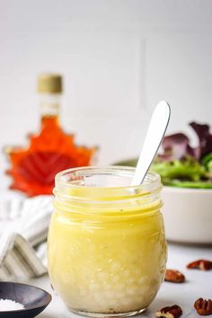 a jar filled with food sitting on top of a table