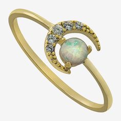 Adding this Silver Treasures 14K gold over silver opal moon ring to your jewelry collection, you are adding sophistication. This ring is crafted in 14K gold over silver and features a simulated opal stone along with Cubic Zirconia stones. With the delicate and sparkling design, this ring can be worn with any wardrobe choices. This ring can be worn alone or with other favorites from your jewelry collection. Wipe ring clean with a soft cloth.Ring Style: Delicate Rings, Stackable Rings, BandsFeatur Fine Jewelry Gold Opal Birthstone Ring, Celestial 14k Gold Opal Gemstone Ring, Gold Celestial Moonstone Ring In 14k, Moon Shaped 14k Yellow Gold Rings, 14k Yellow Gold Moon Phase Rings, 14k Yellow Gold Rings With Moon Phase Detail, 14k Yellow Gold Rings With Moon Phase, Moon Shaped Sterling Silver Opal Ring, Gold Celestial Opal Promise Ring