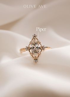 an image of a diamond ring with the words piper on it's front and side