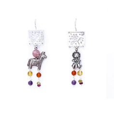 These earrings sound absolutely stunning! They're crafted from silver and feature piñata designs adorned with traditional Mexican muñeca Maria charms.  The designer, Gabriela Sanchez, has taken things to the next level by adding gorgeous touches of amber, amethyst, coral, and turquoise to the design. They are made in Mexico, so you can rest assured that they are authentic and made with incredible attention to detail. You'll definitely make a statement wearing these beautiful earrings! Silver .925 Earrings length: 2.5  inch approx. Papel Picado charm length: .5 inch Burrito and Muñeca charm length: .5 inch Fish hook. Artisan Silver Dangle Plug Earrings, Silver Artisan Dangle Plug Earrings, Artisan Dangle Earrings With Artistic Design, Artisan Silver Earrings With Artistic Design, Silver Artisan Earrings With Artistic Design, Handmade Artisan Silver Chandelier Earrings, Bohemian Sterling Silver Clip-on Earrings, Multicolor Sterling Silver Earrings For Festival, Bohemian Sterling Silver Nickel-free Clip-on Earrings