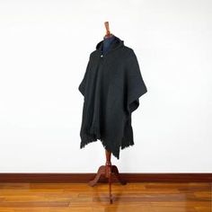 Llama Wool Unisex South American Handwoven Hooded Poncho - solid black – ECUALAMA Black Alpaca Poncho For Winter, Black Alpaca Cape For Winter, Hooded Poncho, Festival Costumes, Cooling Blanket, Colour Pattern, South American, Soft Blankets, Black Pattern