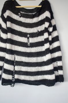 "Distresses black white striped sweater. Chunky knitted oversized unisex mohair jumper. Material: mohair, wool, and acrylic mixed yarn. (80%acrylic,10%mohair,10%wool) This is a handknitted made to order sweater so feel free to message me for different color combinations. Approximate measurement for the sweater ; Small (\"S\") ; Bust: 38\" Widht / Hip : 38\" Length: 25\" Sleeves: 28\" Medium (\"M\") Bust: 40\" Width / Hip : 40\" Length: 26\" Sleeves: 28\" Large (\"L\") Bust: 42\" Widht / Hip : 42 Distressed Sweater Outfit, Loose Knit Jumper, Striped Sweater Outfit, Baggy Sweater, Hand Dyed Scarves, Ripped Sweater, Long Sweater Vest, Mohair Jumpers, Hand Knitted Jumpers