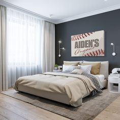 a bedroom with a baseball theme on the wall and a bed in front of a window