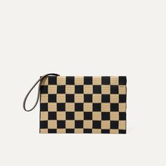 The Wristlet in Checker Classic  This lightweight, versatile style comes in a black and beige checkered pattern.;  Features a detachable wrist strap in black and beige that easily wraps around the handles of any bagor connects to the key leash of The Lightweight Tote for added organization.;  Fits your on-the-go essentials, from accessories and makeup to your phone and keys. ;  Smooth zipper closure keeps your items secure. ;  Length: 11.8 in / 30 cm Height: 7.9 in / 20 cm Handle drop: 8.3 in / Designer Bags Collection, Luxury Designer Bags, Wristlet Pouch, Womens Designer Bags, Clutch Pouch, Wristlet Clutch, Liberty Print, Designer Handbag, Checkered Pattern