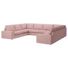 a pink sectional sofa with the seat facing outwards and one arm folded out, on an isolated white background