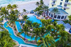 an aerial view of the pool and beach area