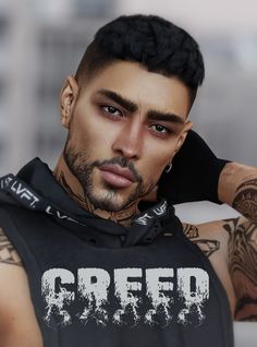 a man with tattoos on his arms and shoulder wearing a black shirt that says creep