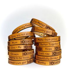 "Be Inspired all Day. Jewelry with meaning. Skinny Full Grain Leather Bracelet Engraved encouraging words and our popular floral patterns. Choose wording or custom wording. Personalization is for the custom selection ONLY .  Made from Full Grain Leather from our local leather shop. We personally cut and engrave each bracelet.  Closure is a button stud, and adjustable. (See sizing below). The leather is soft, comfortable and lightweight, making it great for everyday wear. Each piece of leather is Best Green Bean Casserole, Custom Engraved Bracelet, Bracelet Message, Encouraging Words, Message Bracelet, Bean Casserole, Engraved Bracelet, With Meaning, Green Bean