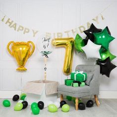 a birthday party with balloons and decorations