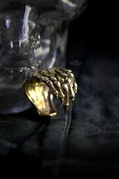 Original Design Handmade Human Hand Skeleton Ring by Defy * Hand skeleton dimensions : 1.8 x 0.3 cm. * Ring sizes : adjustable between 6 - 9 US. **Please choose options below.** - Material : Brass / Silver - Weight : 10 g. **Shipping to World Wide** - Please allow us to prepare the item and parcel between 3-5 working days. For Brass / Silver plated / Gold plated (*Between 5-7 working days For Sterling Silver 925*) - All items will be sent by Thai Registered Airmail. The delivery usually takes ab Human Hand Skeleton, Hand Skeleton, Skeleton Jewelry, Skeleton Ring, Dark Style, Tooth Necklace, Skull Hand, Bronze Ring, Human Hand