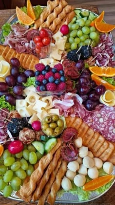 a platter filled with lots of different types of food