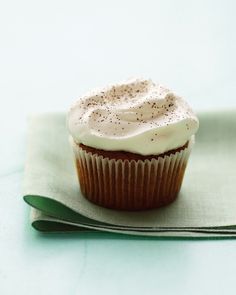 a cupcake sitting on top of a napkin