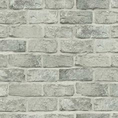 a grey brick wall with no mortars or mortars on the top and bottom