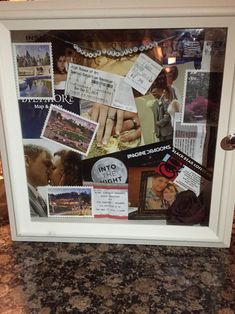 a display case filled with lots of different types of stamps and postcards on it