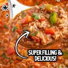 a spoon full of soup with the words superfliling and delicious