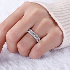 With grace and shimmer, this sparkling band is a classic style that complements her sophisticated taste. As a perfect wedding or anniversary band, it features three tiered rows of shimmering round stones set one atop the other across the center. Lovely worn alone or paired with her wedding rings.Carat Weight: 1.475 ctStone Size: 1.2,2 mmStone Type: Jeulia® StoneNumber of Stones: 55 Stone Color: Diamond WhiteStone Shape: RoundWeight: 5.65 gWidth: 5.4 mmHeight: 2.7 mmThickness: 5.1 mmMaterial: 925 SilverPlating Color: Silver Sparkling Round Band Jewelry For Wedding, Sparkling Baguette-cut Jewelry For Anniversary, Silver Eternity Band With Pave Setting For Wedding, Elegant Silver Channel Set Bands, Elegant Silver Bands With Channel Set, Baguette Cut Sparkling Jewelry For Wedding, Sparkling Baguette Cut Jewelry For Wedding, Silver Cubic Zirconia Half Eternity Band, Silver Wedding Bands With Channel Set