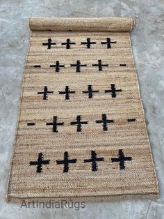 a rug with black crosses on it