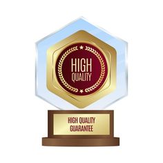 an award trophy with the words high quality on it