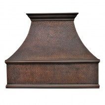 an old fashioned copper range hood on a white background