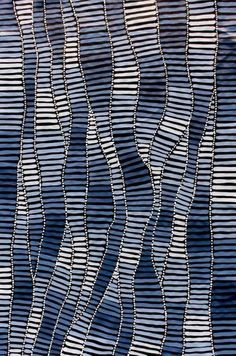 an abstract painting with wavy lines in blue and white