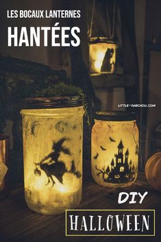 three jars with halloween images on them and the words hantes written in french are lit up