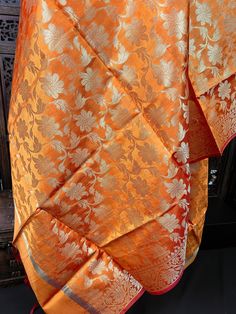 Beautiful Orange double tone dupatta with a tint of orange. Item: Dupatta Base color : Orange Fabric : Soft Silk (Not Pure Silk) Work : Zari Weaved with tassels Size : 2.5 meters Length of the Dupatta : 92 inches approx. Width of the dupatta : 35 1/2 inches (Approx.) Orange Silk Salwar Kameez With Traditional Drape, Traditional Unstitched Orange Salwar Kameez, Orange Anarkali Chanderi Dupatta, Orange Silk Salwar Kameez With Dupatta, Orange Chanderi Anarkali Dupatta, Orange Art Silk Salwar Kameez With Dupatta, Festival Orange Salwar Kameez With Zari Work, Orange Salwar Kameez With Zari Work For Diwali, Orange Unstitched Salwar Kameez For Diwali