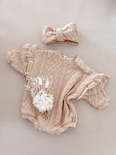 The romper of your dreams has finally landed! Say hello to the all new BABY O ORIGINAL DESIGN Frilly Romper! With stunning detail throughout the Romper fabric and statement frills on the shoulders, this romper is perfect for any occasion! The Frilly Romper has a beautiful matching bow (sold separately) to complete the look! Cute Beige Ruffled Bubble Romper, Cute Beige Bubble Romper With Ruffles, Spring Beige Bubble Romper With Ruffles, Oversized Romper, Little Outfits, Long Socks, Rose Color, Simple Patterns, New Baby