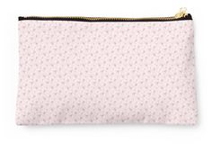 a pink pouch with small flowers on it