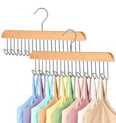 the clothes hangers are made from wood and metal