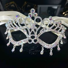 Add A Touch Of Elegance To Your Festival, Wedding, Prom, Party, Or Ball Outfit With This Stunning Silver Masquerade Eye Mask. The Intricate Design Of This Eyemask Features Sparkling Crystal Rhinestones, Making It A Perfect Accessory For Mardi Gras Themed Events. It's Adjustable And Suitable For Both Adult Men And Women. Made In The United States, This Eye Mask Is A Perfect Fit For Those Who Value Fashion And Style. The Masquerade Eye Mask Can Be Worn With Any Outfit To Give You An Air Of Mystery Masquarade Mask, Ball Attire, Prom Mask, Ball Outfit, Starlight Glimmer, Mardi Gras Parade, Cute Sneakers, Themed Events, Masquerade Mask