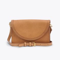 A clutch, a belt bag, a crossbody, a half-cross, an over the shoulder bag, and an interior wallet to keep you effortlessly organized-you name it, we designed her to do it. Over The Shoulder Bag, Over The Shoulder Bags, Leather Care, Cute Bag, Leather Purse, Name It, Leather Working, Handbag Accessories, Belt Bag