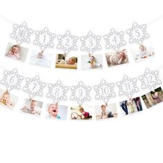 a white banner with photos and numbers hanging from it's sides in the shape of snowflakes